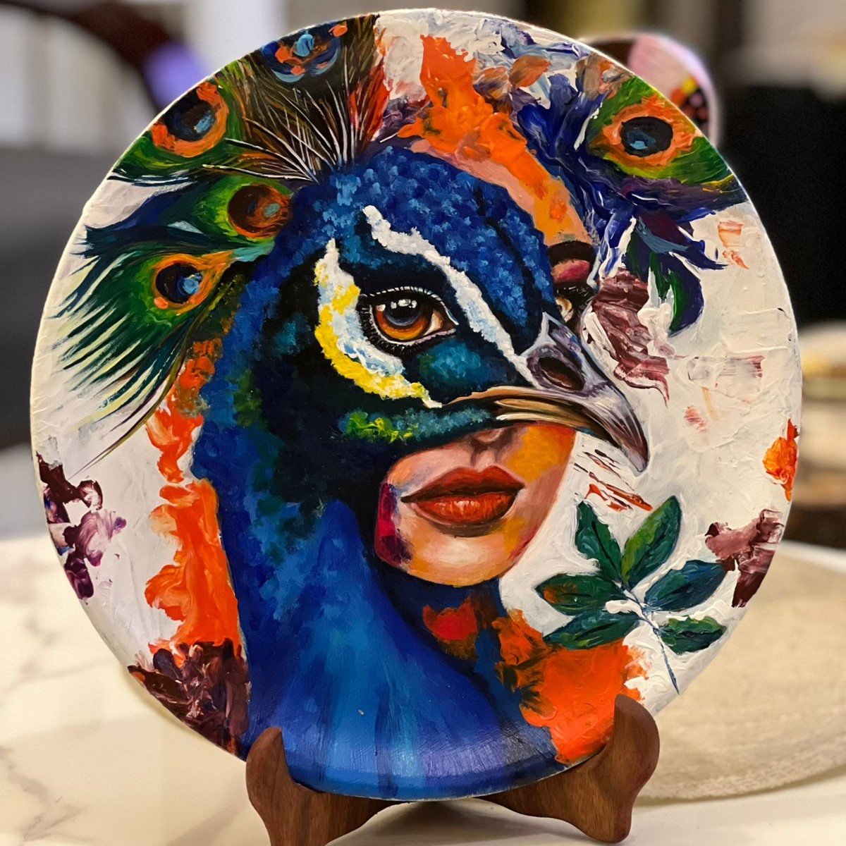 hand-painted terracotta plate is a bold fusion of elegance, imagination, and expressive art.